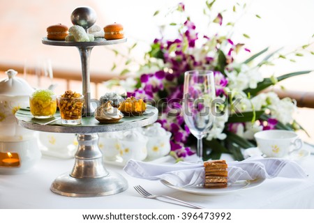 Afternoon tea ceremony, beach restaurant with sea view, flowers