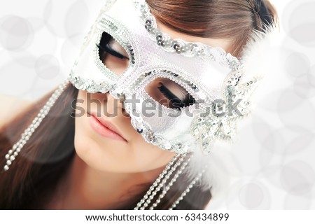 wearing a glamour white party mask with closed eyes