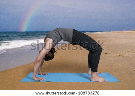 Beautiful black African American woman doing her Yoga exercises