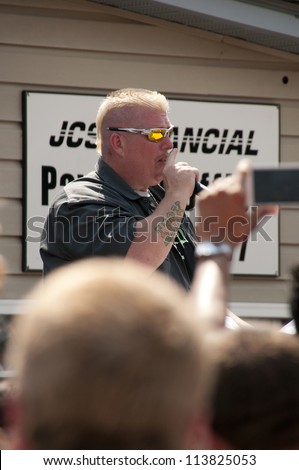 LIZARD LICK, NC - SEPTEMBER 15: Ronnie Shirley of the reality show Lizard Lick Towing talks to fans at the actual Lizard Lick Towing shop at an autograph signing on September 15, 2012 in Lizard Lick / Wendell, NC