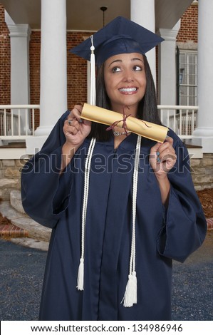 Young black african American woman in her graduation robes