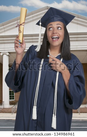 Young black african American woman in her graduation robes