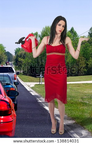 Beautiful woman with gas can out of gas
