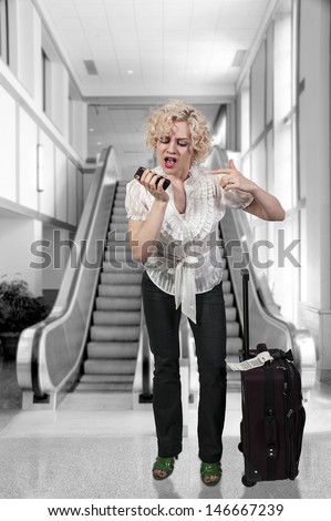 Beautiful angry woman talking on a cell phone