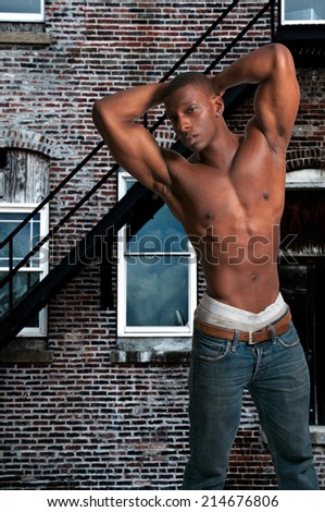 Young African American black man with his shirt removed (photo illustration / image composite)