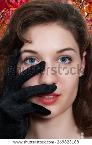 Beautiful young attractive high society woman wearing formal opera gloves