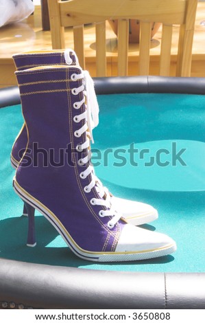 A pair of high heel tennis shoes