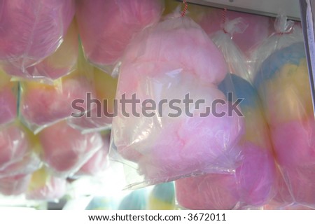 Cotton candy hanging in a concession stand.