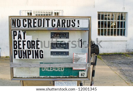 Old gas pumps with old gas prices.