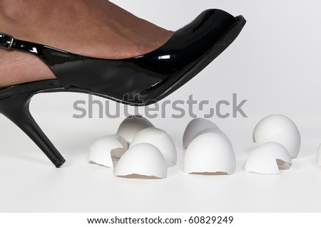 A woman in high heels walking on eggshells