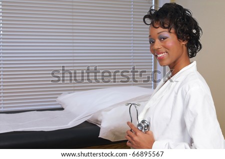 A beautiful black woman medical doctor in a lab coat