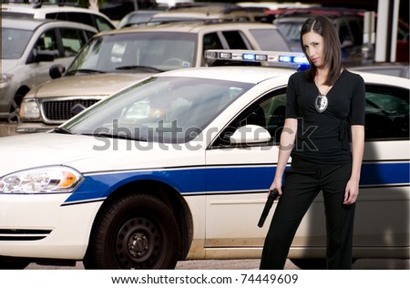 A beautiful police detective woman out protecting and serving the public.