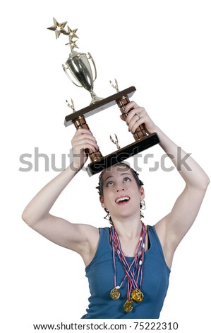 A beautiful woman wearing medals holding a large trophy