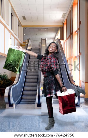 A young beautiful black African American teenage woman on a shopping spree