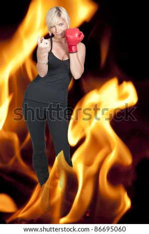 A beautiful woman wearing a boxing glove signaling with her finger for someone to come here