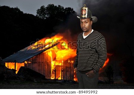 Black African American man firefighter at a fire
