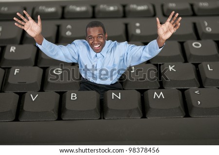 Man trapped inside a keyboard but surprisingly happy about it