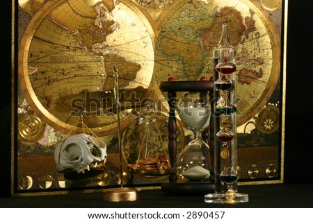 Scales comparing money and skull with hourglass, Galileo thermometer, and world map