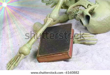 Skeleton with Bible or Prayer Book