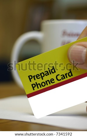 Prepaid Phone Card in man\'s hand