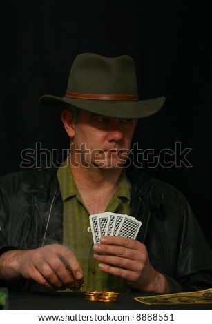 Gambler placing bet and looking to his left