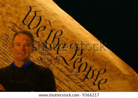Casual man superimposed on the United States Constitution