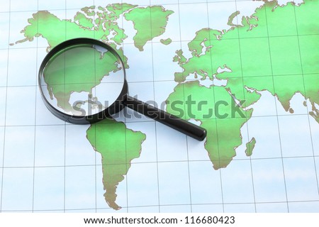 Magnifying glass black frame on world map paper.