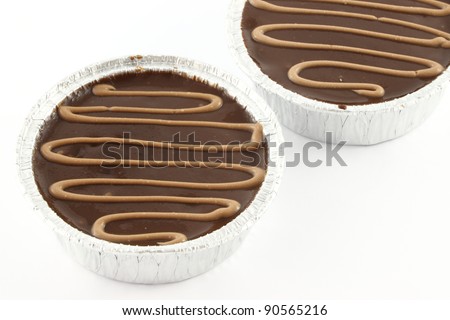 Top cream chocolate cake in foil package.