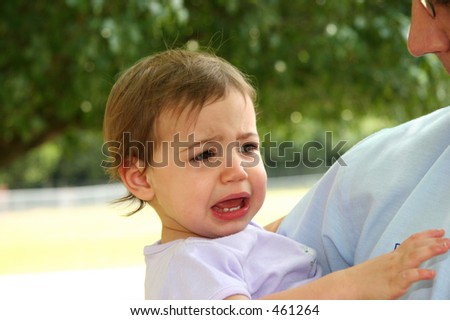 girl crying. of baby girl crying while