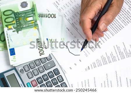 Market data euro hand and pen calculator