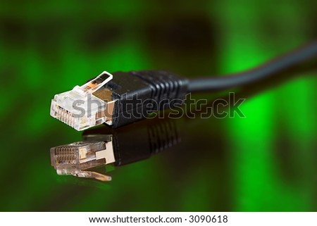 computer ethernet cable on green background
