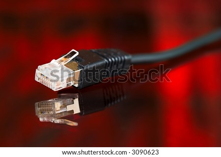 computer ethernet cable on red background
