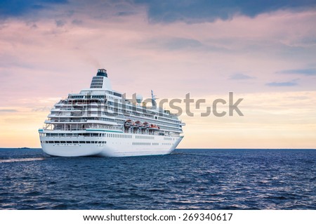 Big cruise ship in the sea at sunset. Beautiful seascape