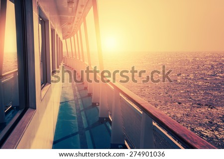 Cruise ship in sea at sunset. Beautiful summer seascape. Creative vintage filter, retro effect