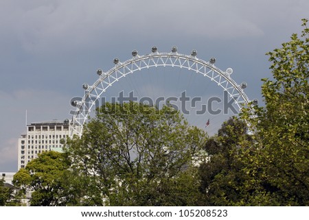 LONDON-MAY 14:View of The London Eye on May 14, 2010 in London, England.A famous tourist attraction at a height of 135 meters (443 ft) and the biggest Ferris wheel in Europe