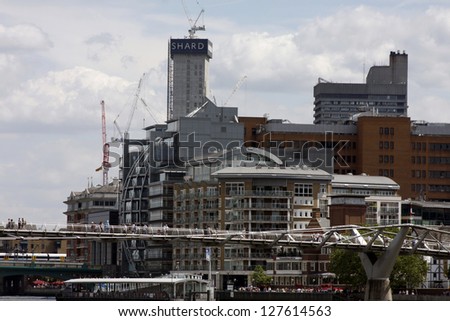 LONDON, ENGLAND - JULY 24: The Shard under construction at London Bridge on the River Thames on July 24, 2010 in London, England. When complete it will be the tallest building in the European Union.