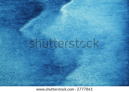 water flow over a blue stone.