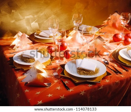 Decorated christmas table with red table cloth