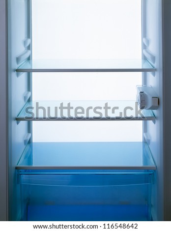 Empty Refrigerator. The inside of an open fridge