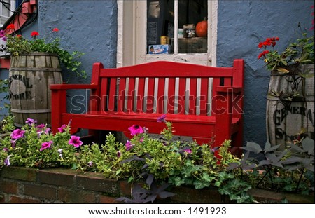 Red Bench Outside a General Store