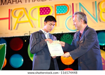  - stock-photo-udornthani-thailand-oct-dr-kazuo-inoue-president-of-yamaha-thailand-music-festival-116574448