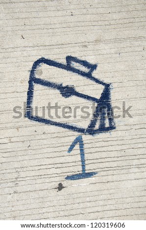 Freehand with brush and oil color on concrete floor illustrated bag sign of standing line for kindergarten kid in school.