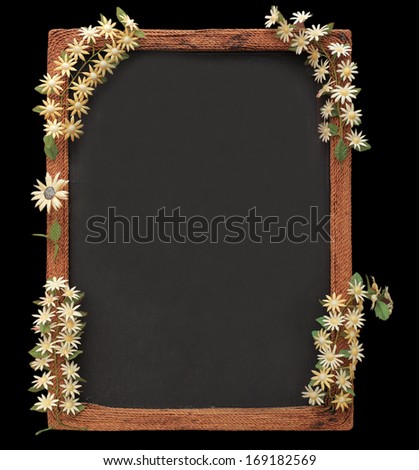 blackboard with wooden frame and flowers made from silk cocoon border isolated on black with work path