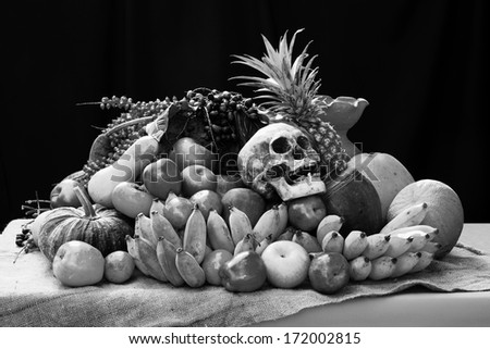 still life art photography on skull banana pumpkin and wood log with clay jar black and white version
