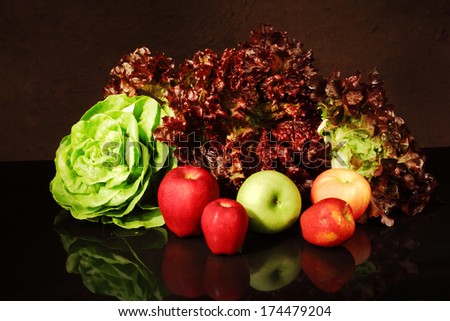 Butter Head and Red Coral hydroponic salad vegetable with red and green apples