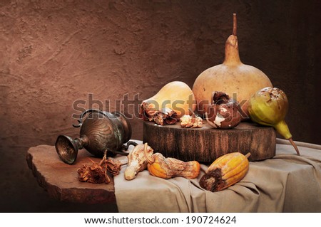 Expired pumpkins with calabash as still life art photography