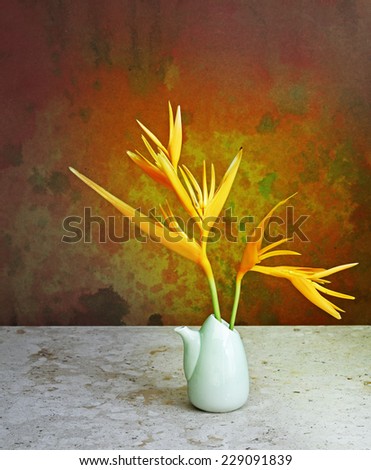 Bird of paradise flower in vase Japanese style arrangement