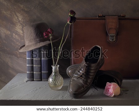 Still life art on casual concept with hat book leather bag shoes
