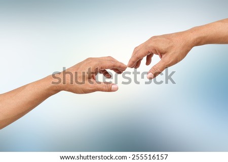 hands touching on blur background with hands path