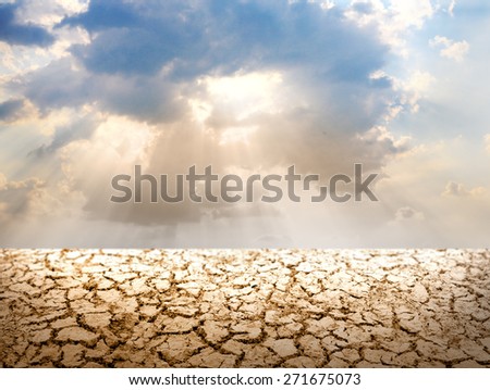 Donut ring cloud with sun with front cracked land soil